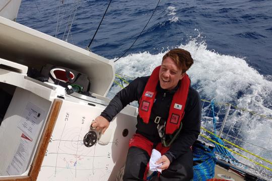 Matt Sharing Tactics on the Boat